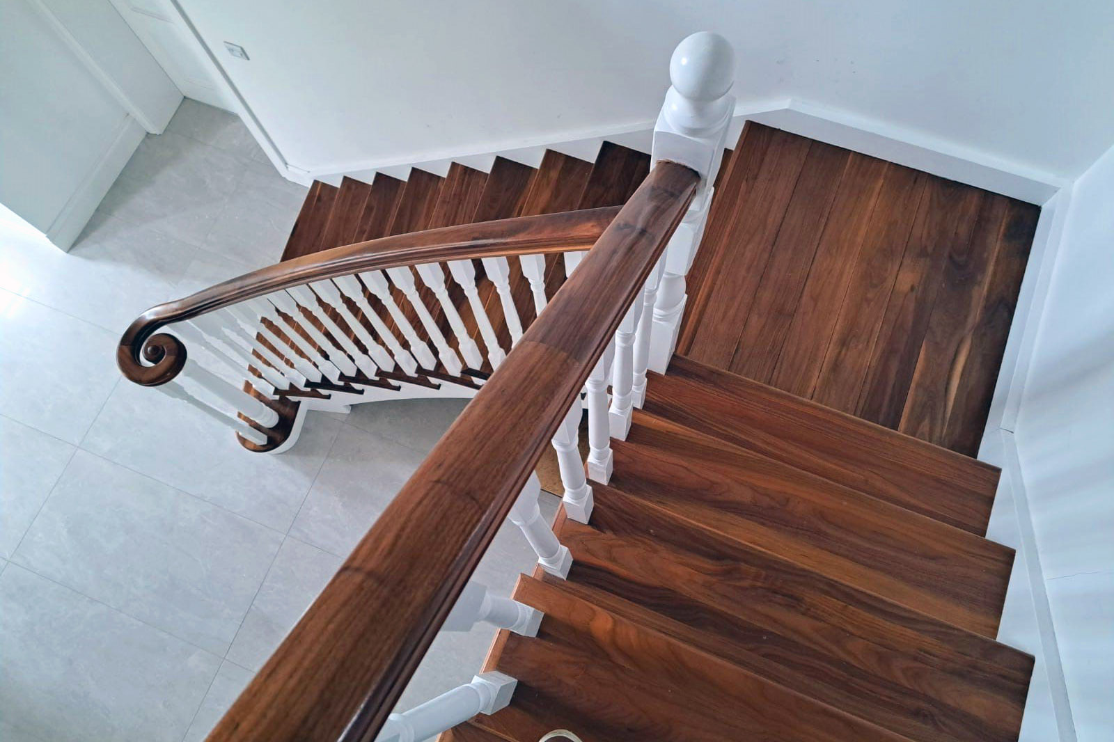 bespoke walnut and white cut string stairs